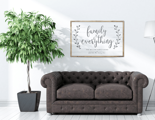 Living room with a framed Family Is Everything personalized print