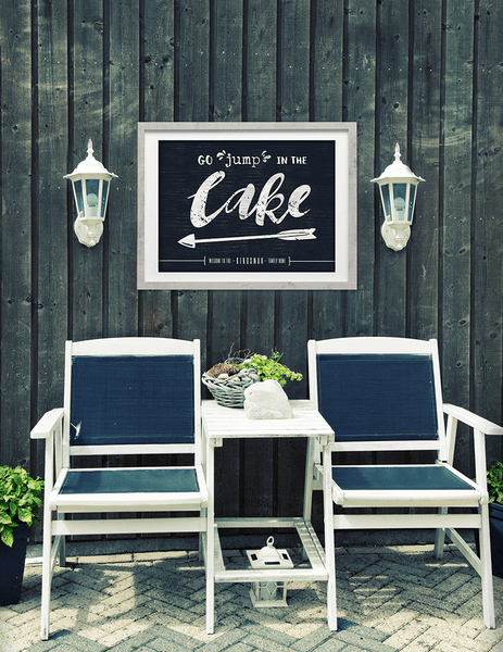 outdoor set with the "go jump in the lake" personalized print on the wall.