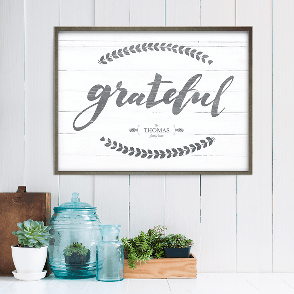 shiplap walled room with rustic accents and a framed Grateful personalized print