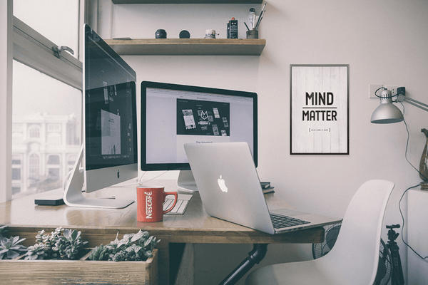 Mind Over Matter personalized print framed on a wall in a modern workspace