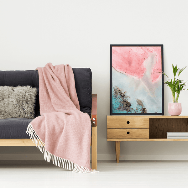 Unlocal print in a modern apartment with blush pink accents
