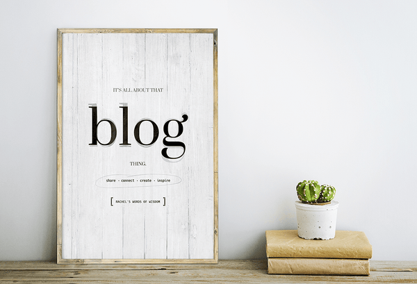 farmhouse shelf with books and a cactus and the Blog Thing personalized print in a rustic frame 