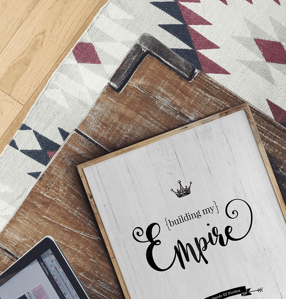 modern room with a framed Empire personalized print