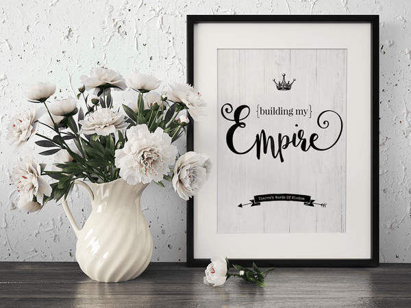 Desk with a framed Building My Empire personalized print