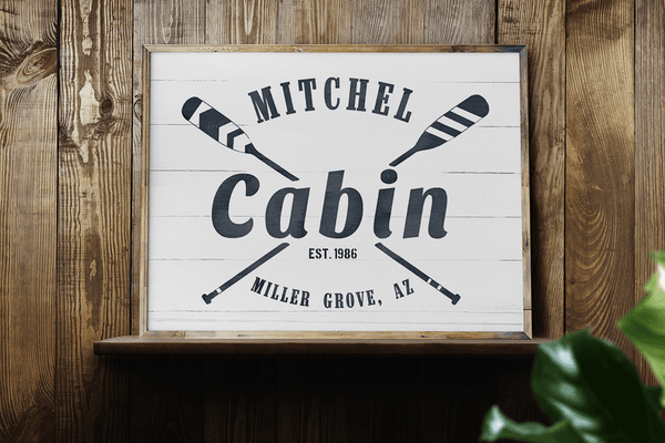 Cabin personalized Print framed on a shelf in a rustic cabin