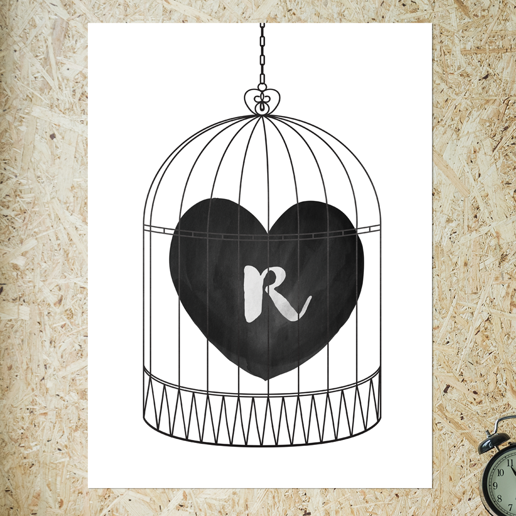 watercolor heart in a bird cage. have an initial set in the heart. black and white print