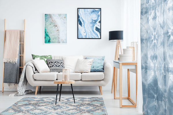 Ebb and Timeless prints in a modern, boho-inspired room