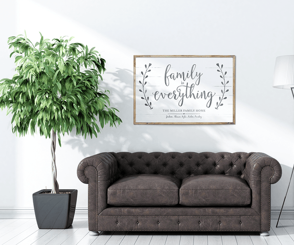 Living room with a framed Family Is Everything personalized print