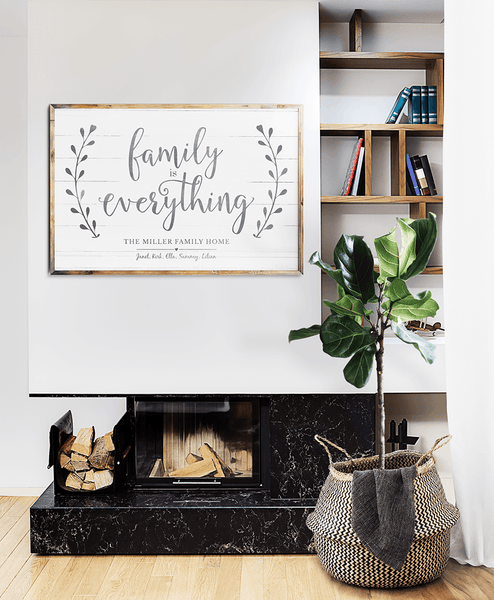 modern room with a framed Family Is Everything personalized print