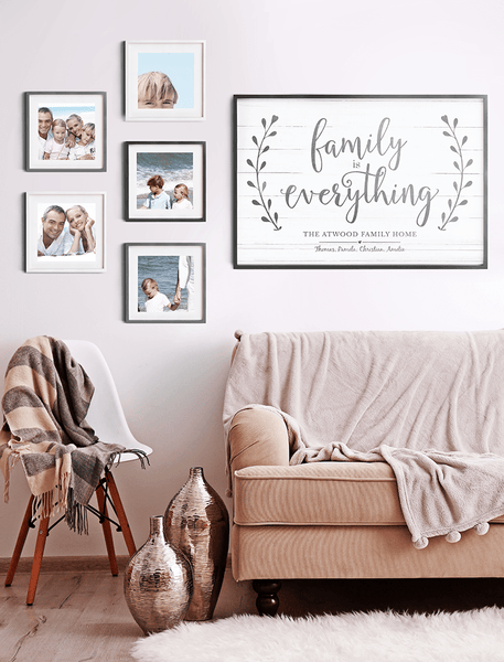 Beautiful family photo wall with the Family Is Everything personalized print 