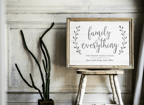Family is Everything personalized print framed and displayed in a rustic farmhouse setting