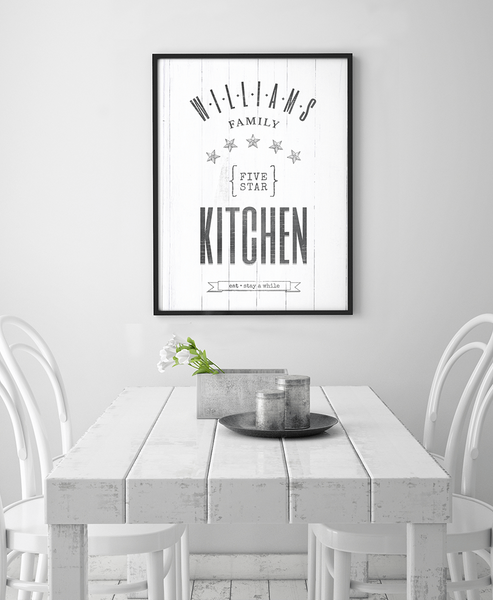 white, rustic kitchen with the Five Star Family Kitchen print framed on the wall