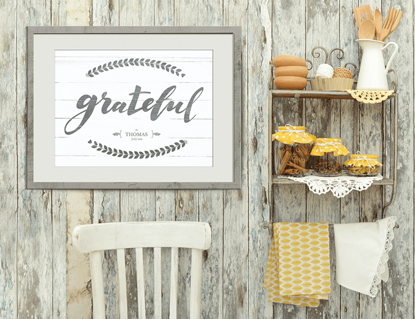 Rustic kitchen with the "Grateful" personalized print hanging on the wall.