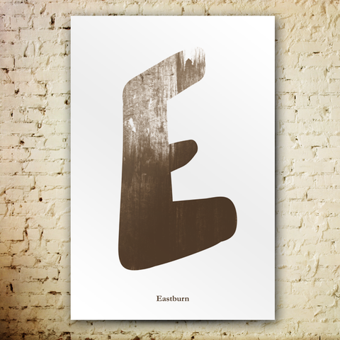 Grunge-Cepia poster. Big letter E with a cepia texture on white background. Last name Eastburn written underneath.