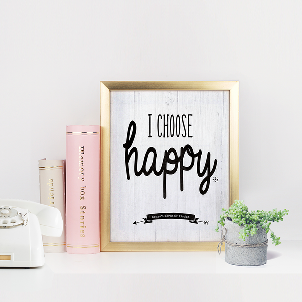 Bright modern office setting with I Choose Happy personalized print framed in gold frame