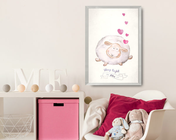 Baby, nursery room with watercolor lamb poster.