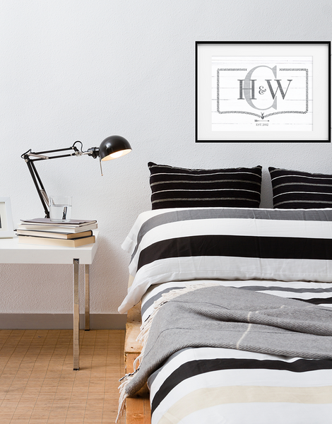 modern bedroom with the Monogram print framed above the bed.