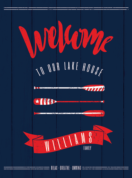 close up of welcome at our lake house sign