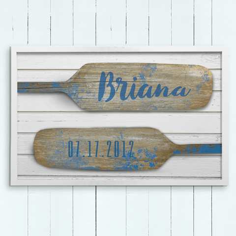 nautical theme print of wood paddles with a name on one and a birthdate on the second paddle. Perfect for kids or baby rooms!
