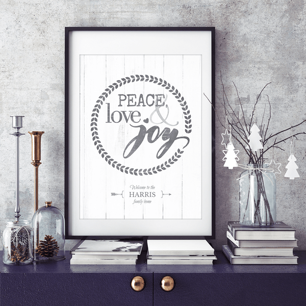 Holiday themed vignette with framed print Peace, Love & Joy