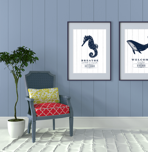 Cottage room with Seahorse and Whale nautical prints. 