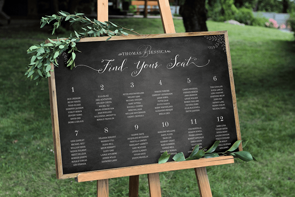 Chalkboard Seating Chart Personalized Print on a easel at an outdoor wedding