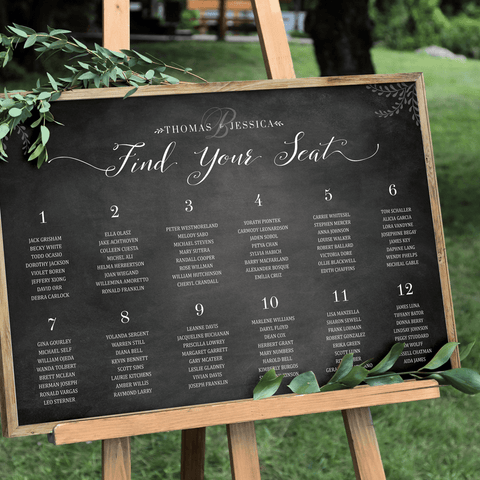Chalkboard Seating Chart Personalized Print on a easel at an outdoor wedding