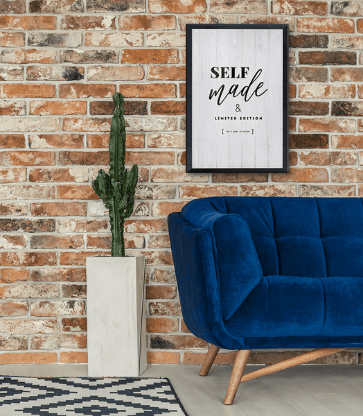 Self Made personalized print in a modern room with brick wall