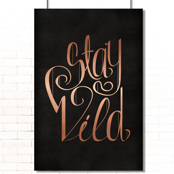 Metallic copper text "Stay Wild" on a black leather texture poster