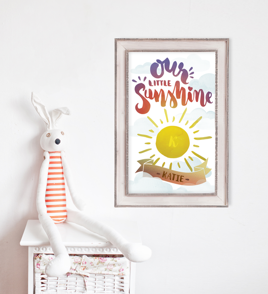 baby room with Our Little Sunshine watercolor print on the wall.