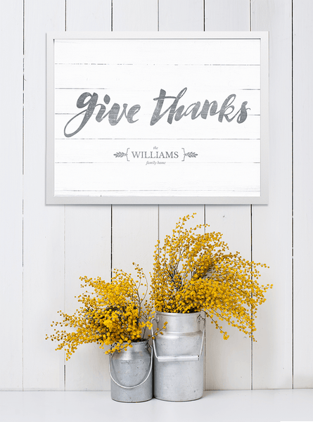 shiplap wall with fall decorations and the Give Thanks personalized print.