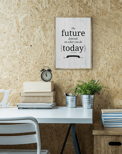 modern workspace with The Future Personalized Print framed on the wall