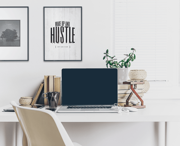 modern, contemporary home office with a framed motivational Wake Up and Hustle personalized print on the wall