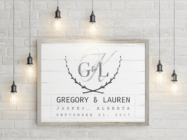 Wedding Day personalized print framed on the wall among rustic hanging lights
