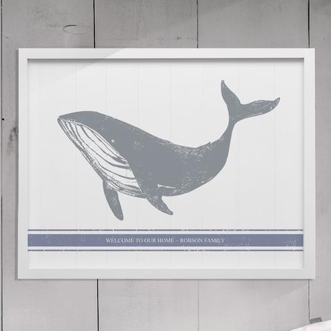 Rustic drawing of a whale with a blue stripe below. Personalize it with your family name!
